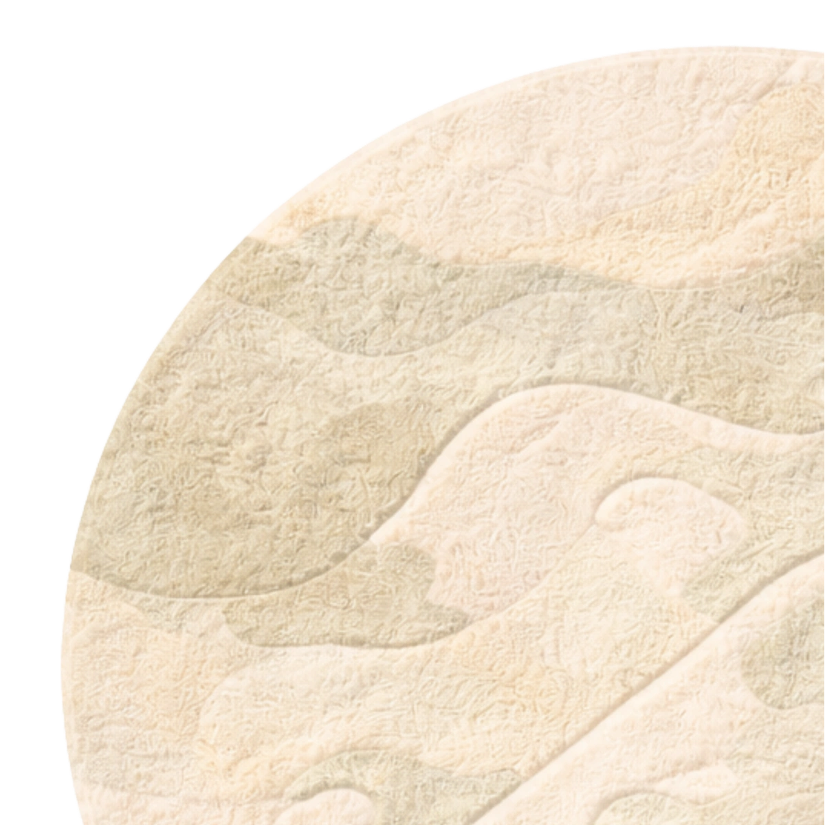 Round beige bath mat with wave pattern on a white background