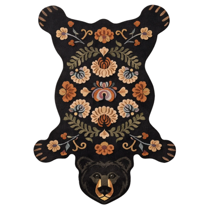 Bear-shaped black hand-tufted wool rug with colorful folk art floral design