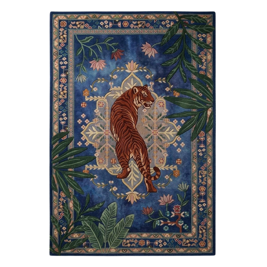 Blue tiger botanical hand-tufted wool area rug with ornate border and jungle foliage design