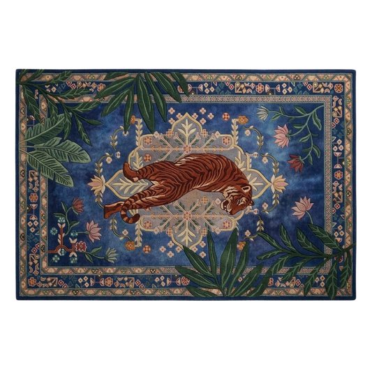 Luxury tiger wool rug with floral patterns and deep blue background for statement interiors