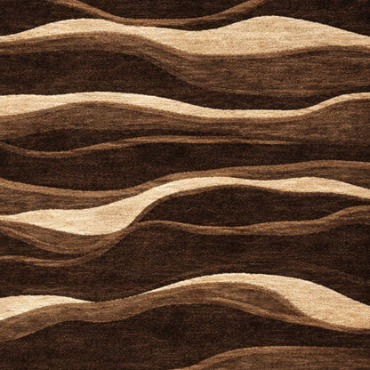 Hand-tufted area rug in brown tones with layered wave texture pattern