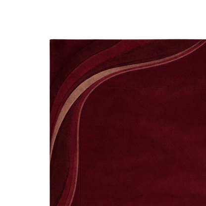 Deep burgundy contemporary rug with corner wave pattern and premium hand-tufted texture