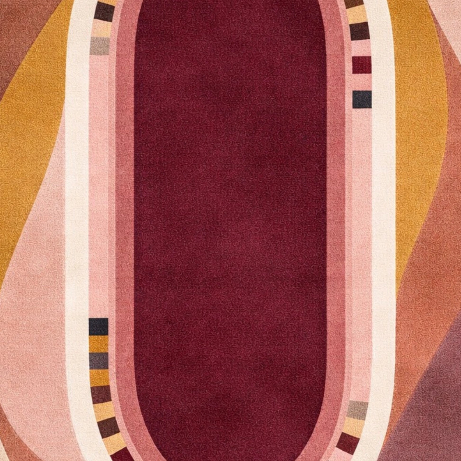 A close-up of a patterned textile or rug featuring a central deep burgundy oval bordered by pink, cream, mustard yellow, and mauve wavy stripes with small geometric accents.