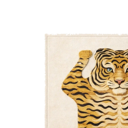 A close-up of a rug featuring a stylized tiger illustration on a cream background, with the rug corner visible against a white studio backdrop.