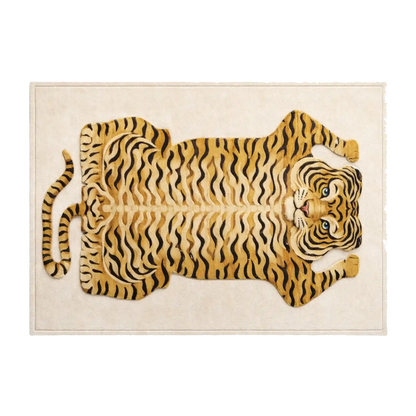 A rectangular area rug featuring a large stylized tiger design in golden yellow, black, and beige tones on a cream background.