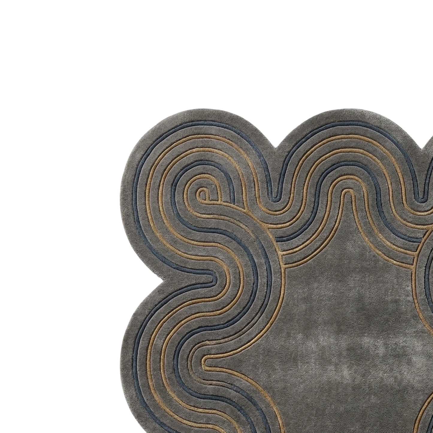 A close-up of a gray textured rug with a scalloped edge and layered wavy patterns in dark blue and tan.