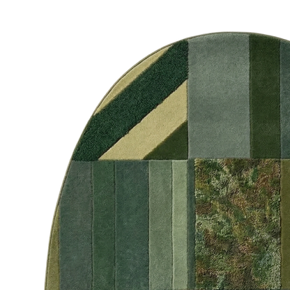 Contemporary patchwork rug with forest green, sage, and olive geometric patterns