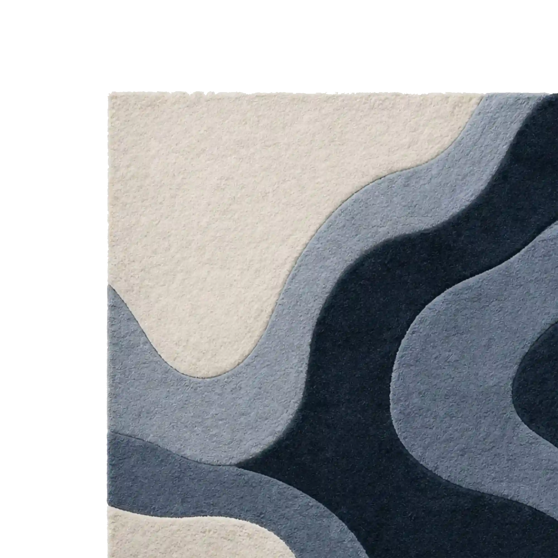 Abstract area rug with layered wavy organic shapes in cream, light blue, medium blue, and dark navy, shown cropped on a white background.