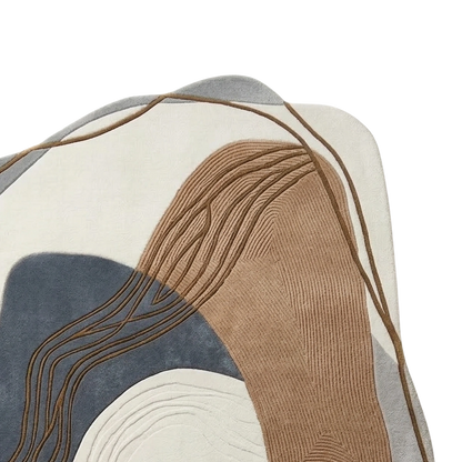 Abstract area rug with organic shapes in beige, taupe, slate blue, and light gray, featuring textured ribbed patterns and thin brown line details.