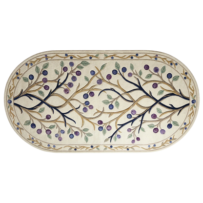 An oval ceramic plate or tray with a cream-colored background, decorated with a hand-painted style pattern of dark blue branches, purple and blue berries, and green leaves, bordered by a matching floral pattern.
