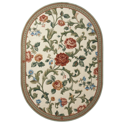 An oval area rug featuring a classic floral vine pattern with red and orange roses, green leaves, and small blue flowers on a cream background, finished with a decorative braided border.