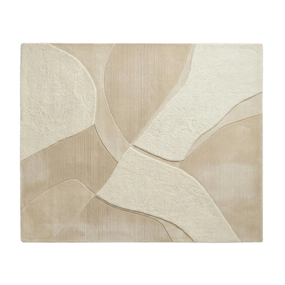 A rectangular area rug with an abstract, modern geometric pattern in shades of beige, cream, and light tan, featuring a textured, layered design.