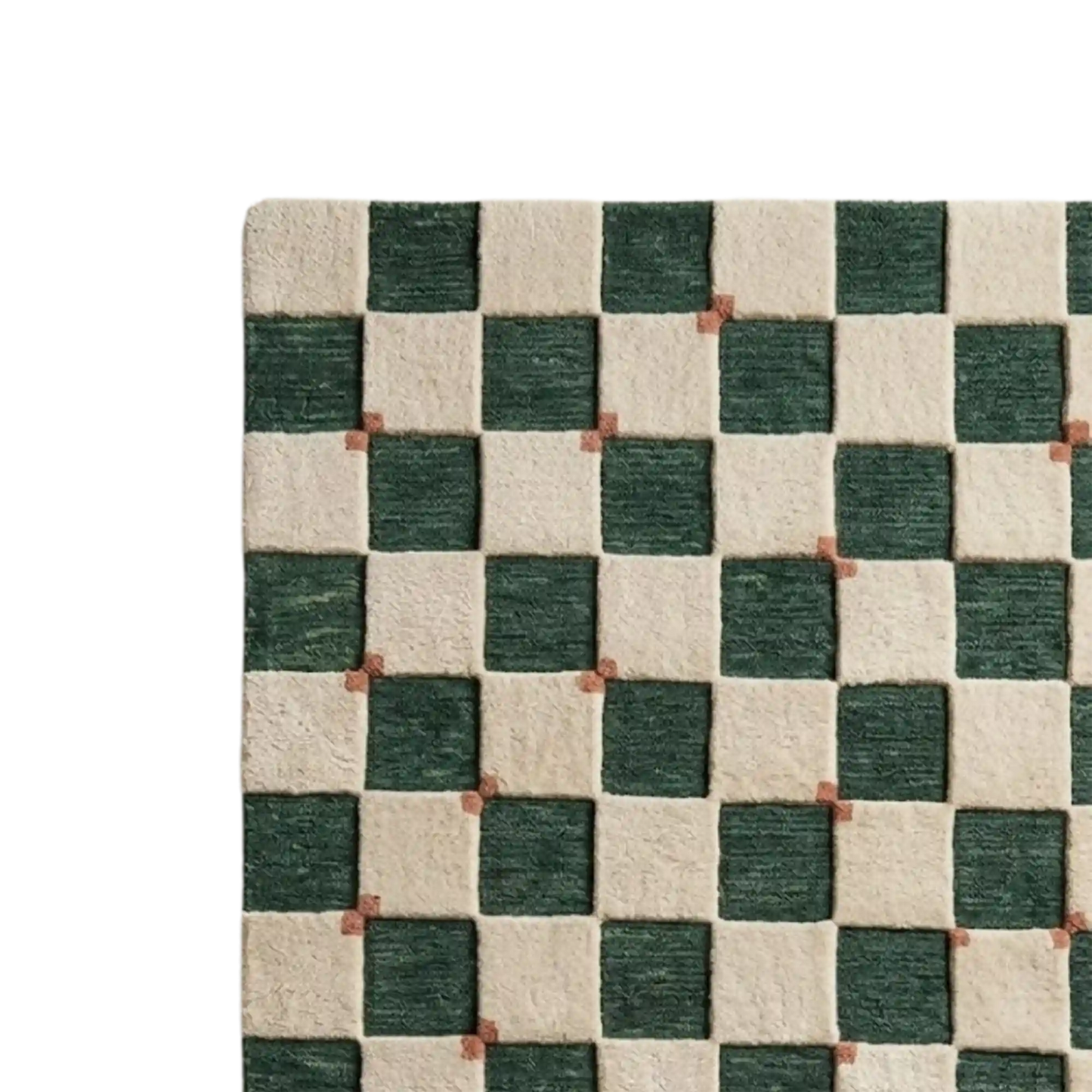 A close-up of a woven rug with a green and cream checkerboard pattern, showing the texture of the fibers and small brown accent squares at the intersections.