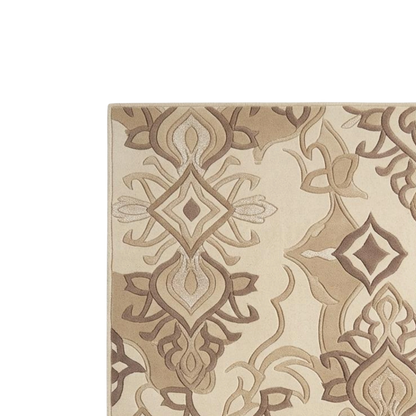 A close-up of a patterned area rug with an ornate medallion and scroll design in beige, tan, and brown tones on a white background.
