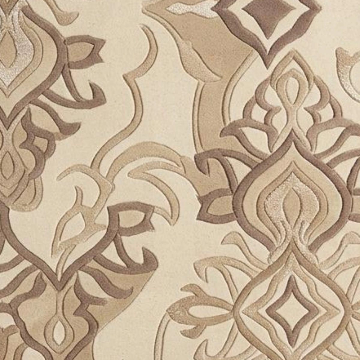 Beige and brown damask patterned fabric or wallpaper with a textured, raised design.