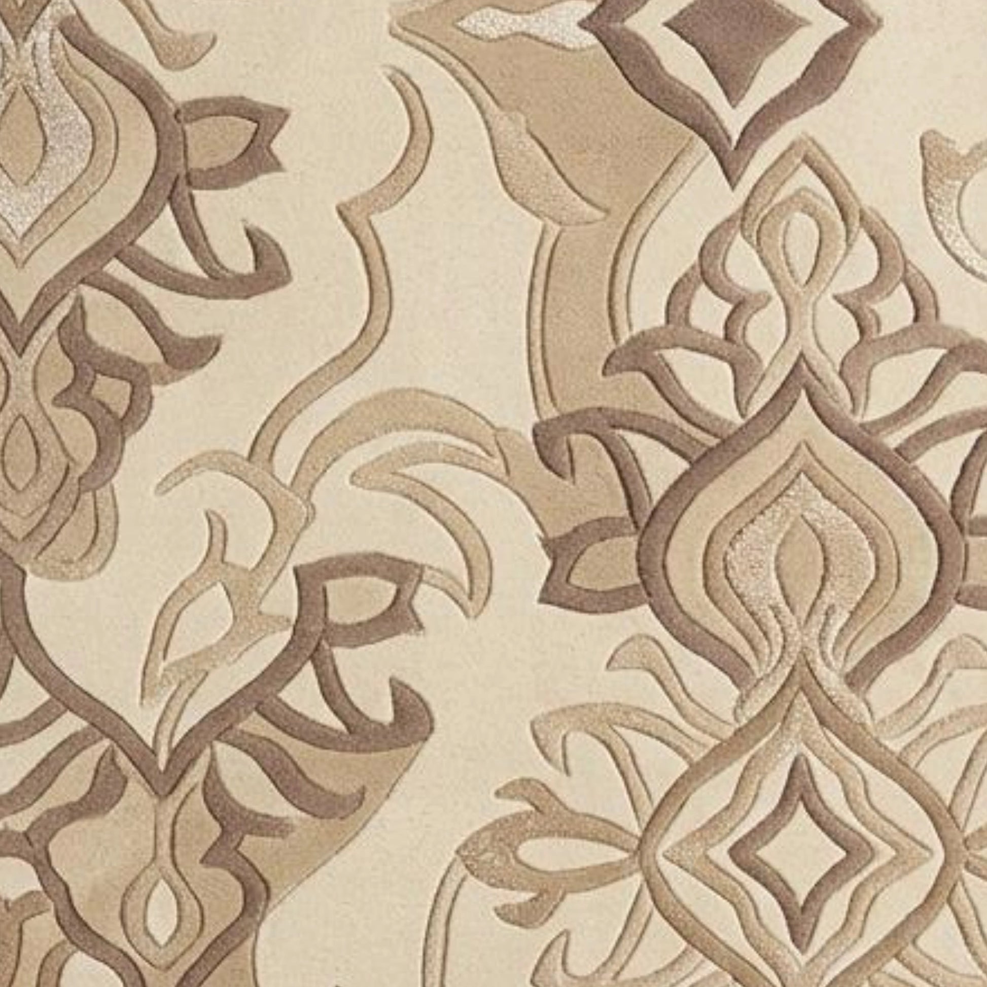 Beige and brown damask patterned fabric or wallpaper with a textured, raised design.