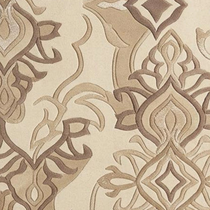 Beige and brown damask patterned fabric or wallpaper with a textured, raised design.