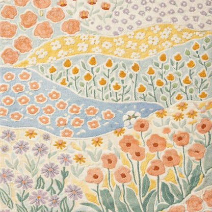 Botanical wildflower pattern hand tufted wool area rug in soft pastel colors, modern decorative rug for bedroom and living space