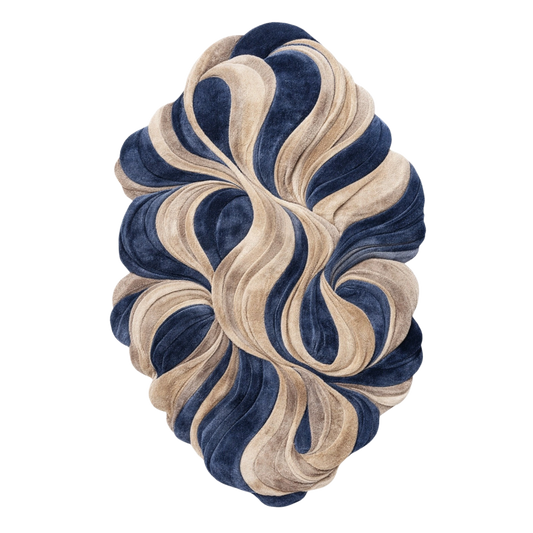 An oval-shaped plush velvet throw pillow featuring a marbled swirl pattern in navy blue and beige, isolated on a solid white background.