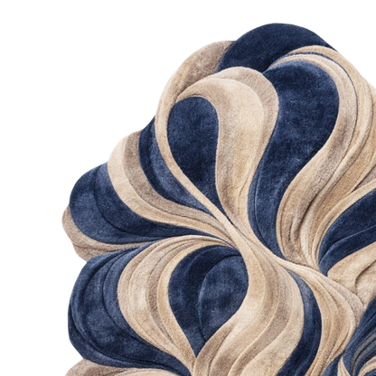 A close-up of a plush velvet fabric with a wavy, layered pattern in navy blue and warm beige, isolated on a white background.