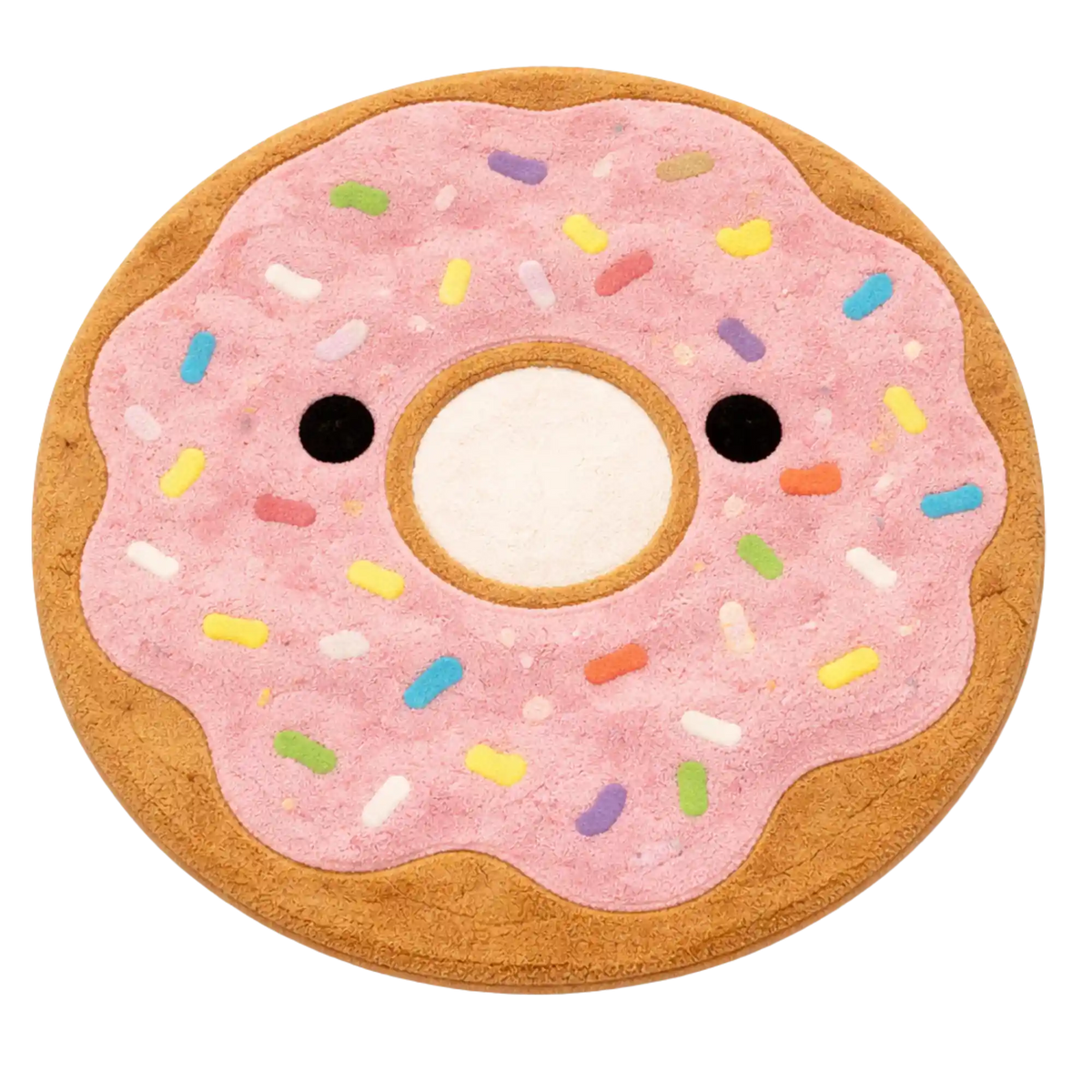 A plush donut-shaped rug with pink frosting, multicolored sprinkles, and embroidered black eyes on a white background.