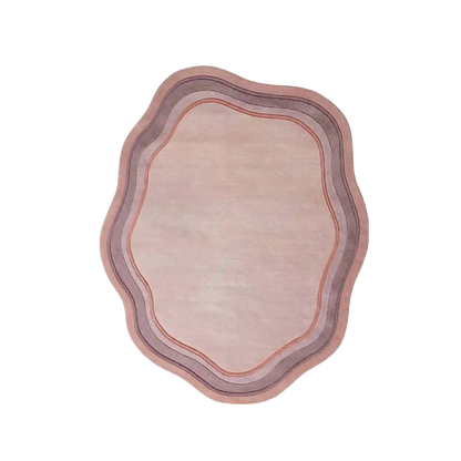 Contemporary pink pastel hand-tufted wool rug featuring an organic scalloped shape and tonal curved border detailing