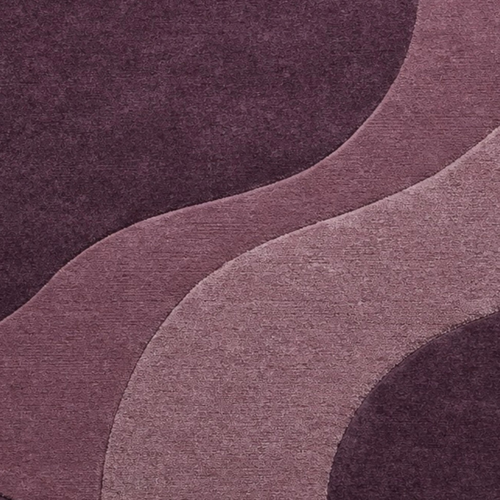 A close-up of a textured fabric or wallpaper pattern featuring abstract, flowing wavy shapes in shades of plum purple, mauve, and dusty rose.