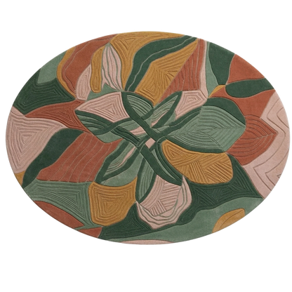 An oval area rug featuring a symmetrical, abstract floral or geometric pattern in muted tones of sage green, terracotta, mustard yellow, and dusty pink, shown against a plain white background.