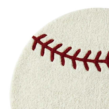 Close-up of a white baseball with red stitching on a white background