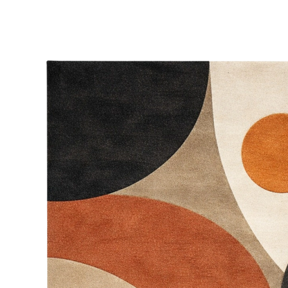 Geometric patterned rug with black, orange, and beige colors on a white background
