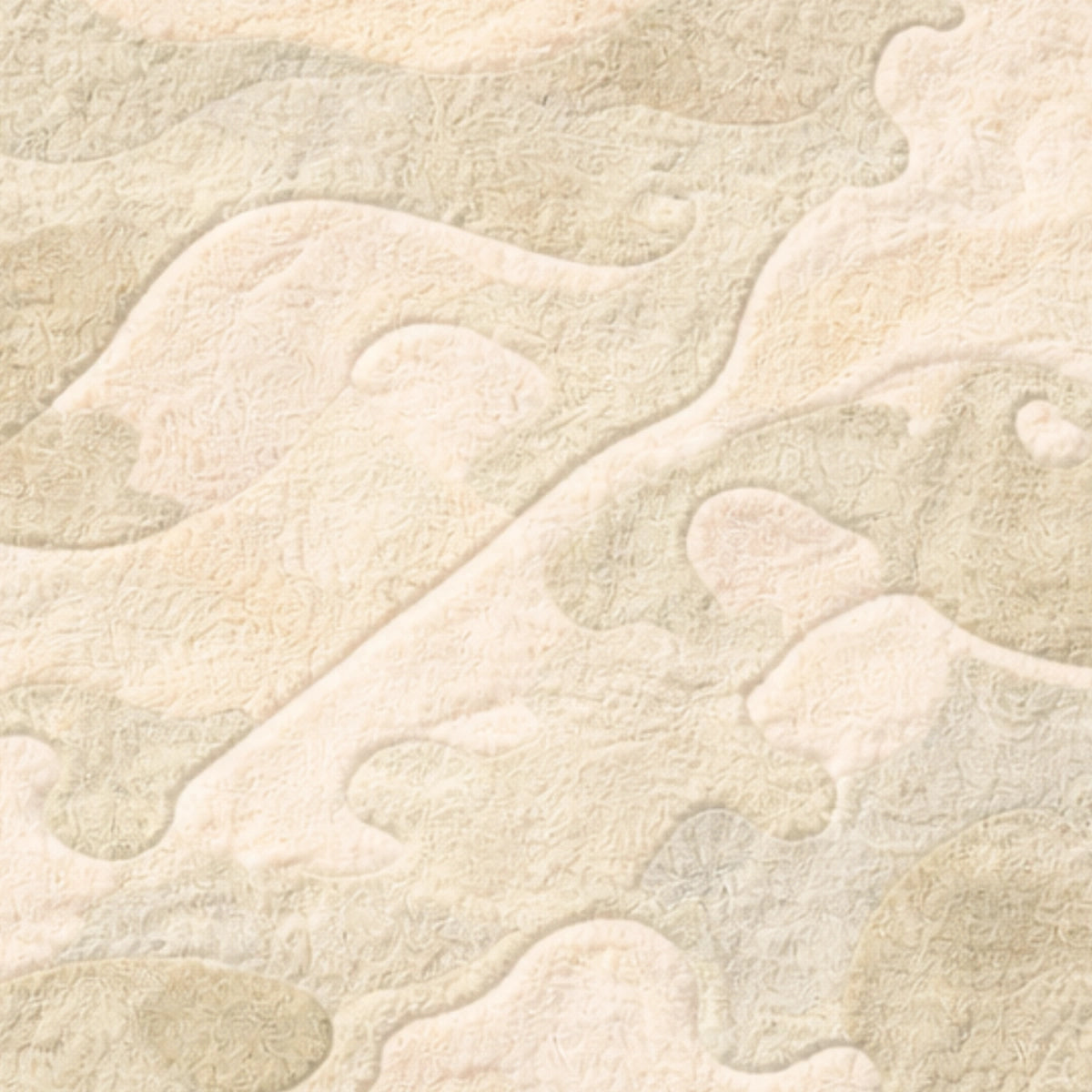 Close-up of textured beige fabric with a subtle pattern