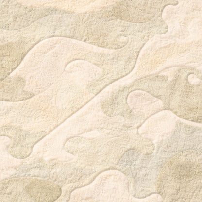Close-up of textured beige fabric with a subtle pattern