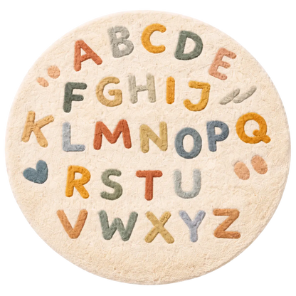 Round rug with colorful letters of the alphabet on a white background