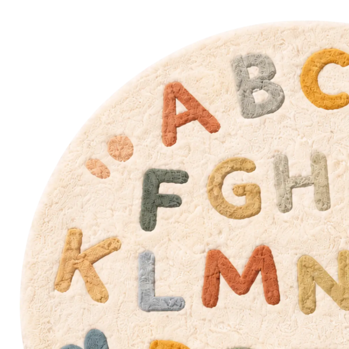 Round rug with colorful letters on a white background