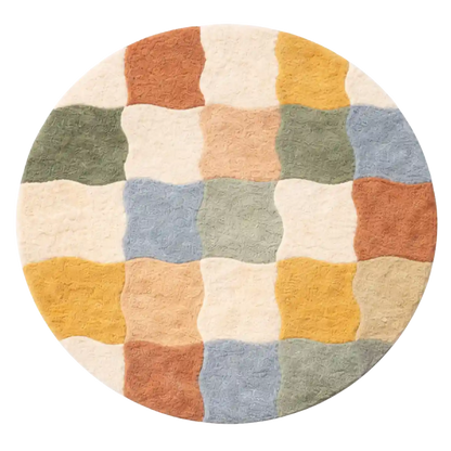 Round patchwork rug with multicolored squares on a white background