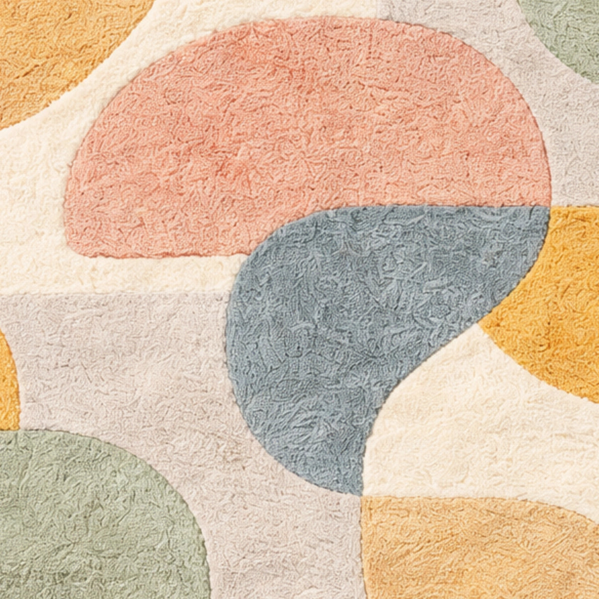 Close-up of a textured fabric with colorful geometric shapes.