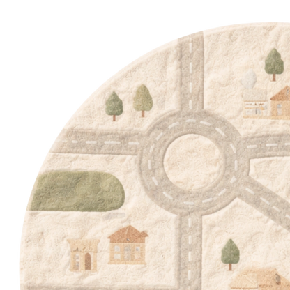 Round rug with road design, houses, and trees on a white background