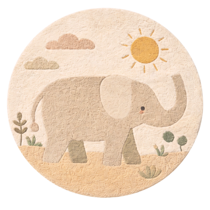 Round rug with an elephant design on a beige background