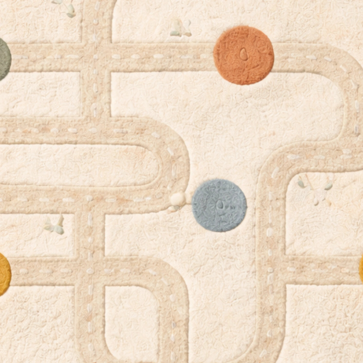 Close-up of a textured surface with wavy lines and circular elements in various colors.