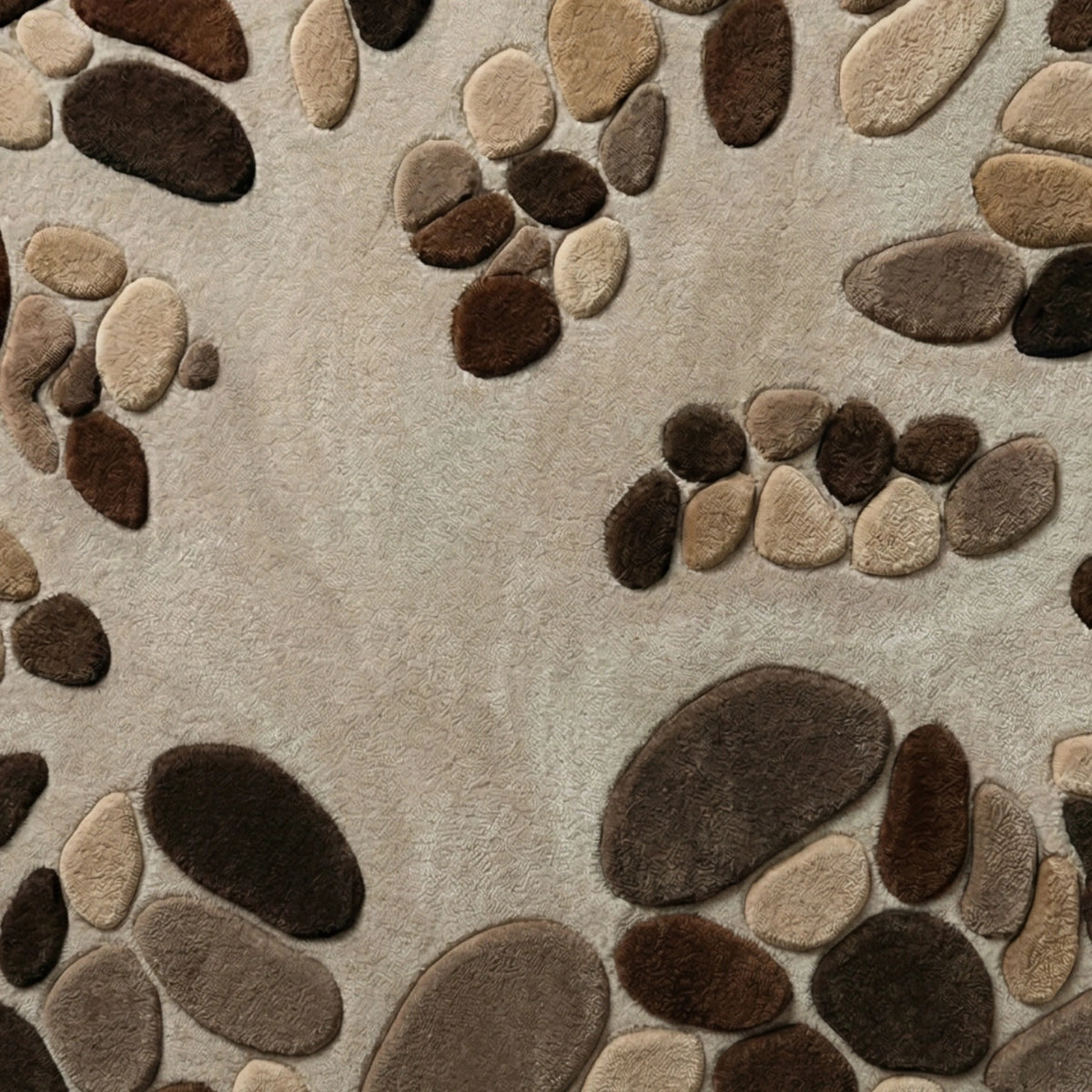 Pattern of brown and beige stones on a beige background