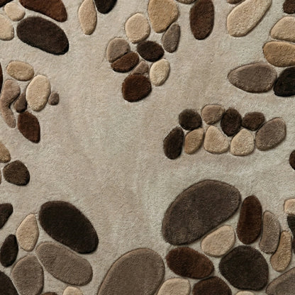 Pattern of brown and beige stones on a beige background