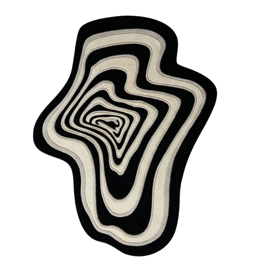 Black and white irregular hand-tufted wool rug with modern abstract contour design