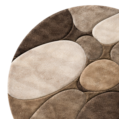 Round rug with stone-like pattern in brown and beige tones on a white background