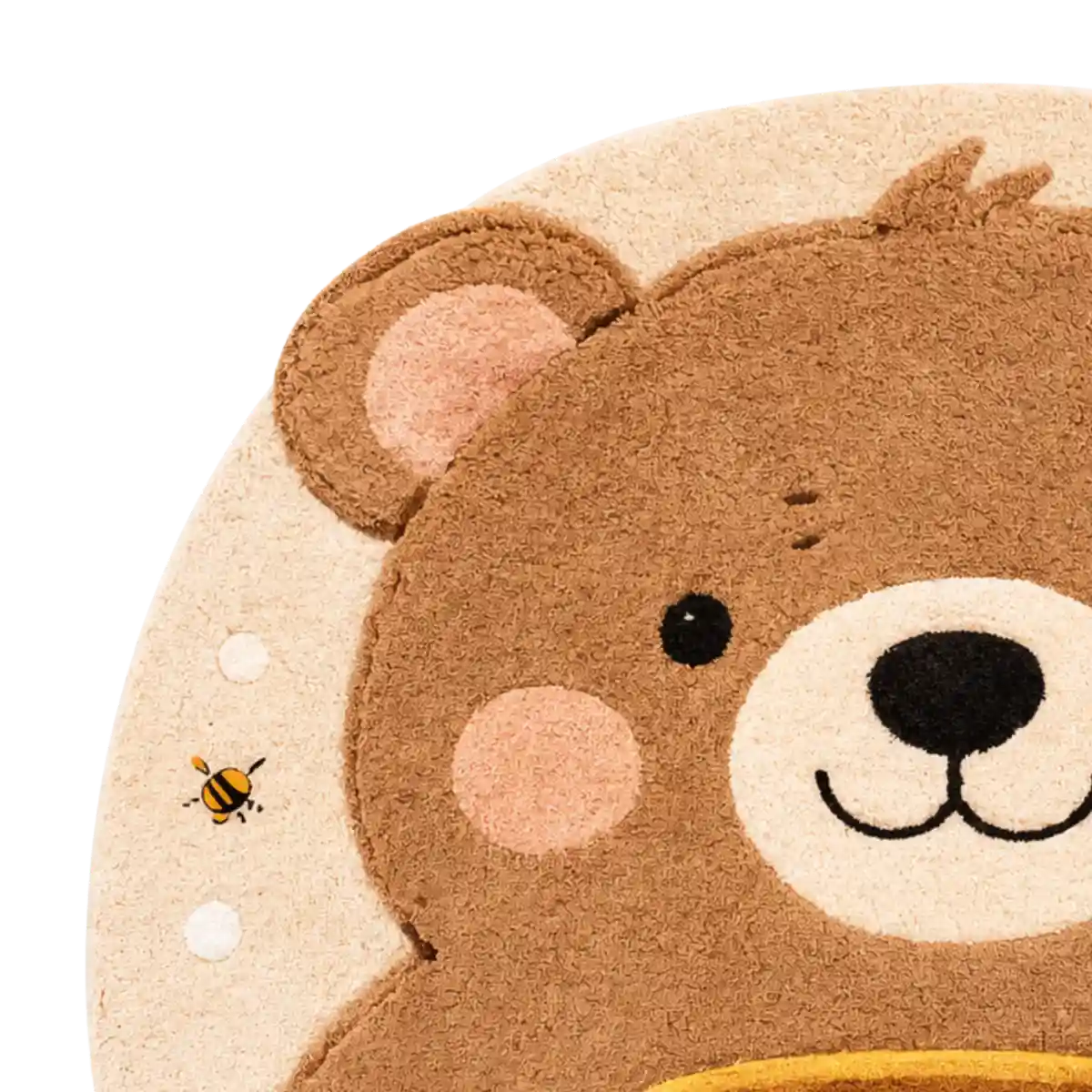 Close-up of a teddy bear-shaped rug with a bee on a white background