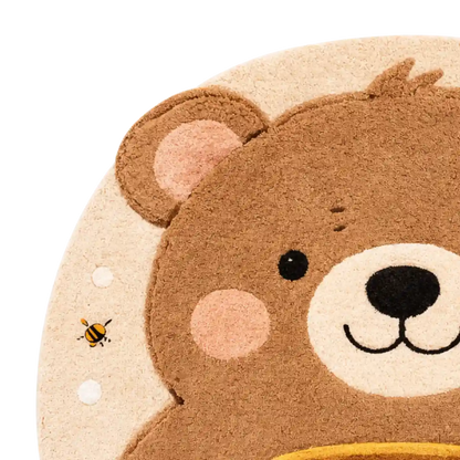 Close-up of a teddy bear-shaped rug with a bee on a white background
