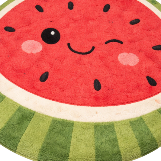 Round rug with a watermelon design featuring a smiley face.